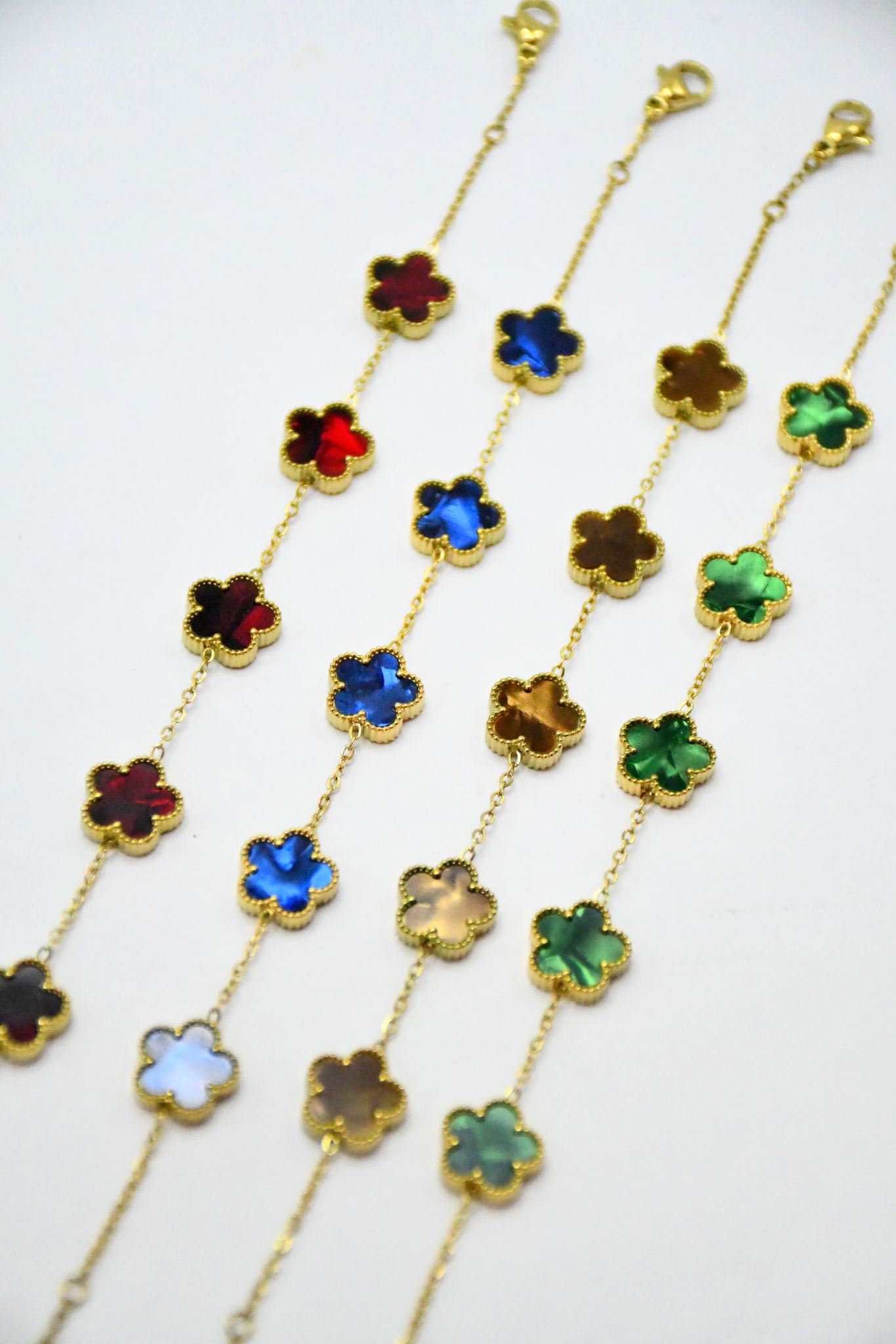 Bracelet doré fleurs trèfle